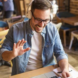 240 Hour Advanced TEFL Course, man studying TEFL on the laptop