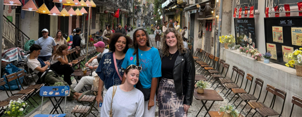 TEFL teachers exploring a vibrant street in Asia – best countries for every traveller to teach English abroad and experience local culture together