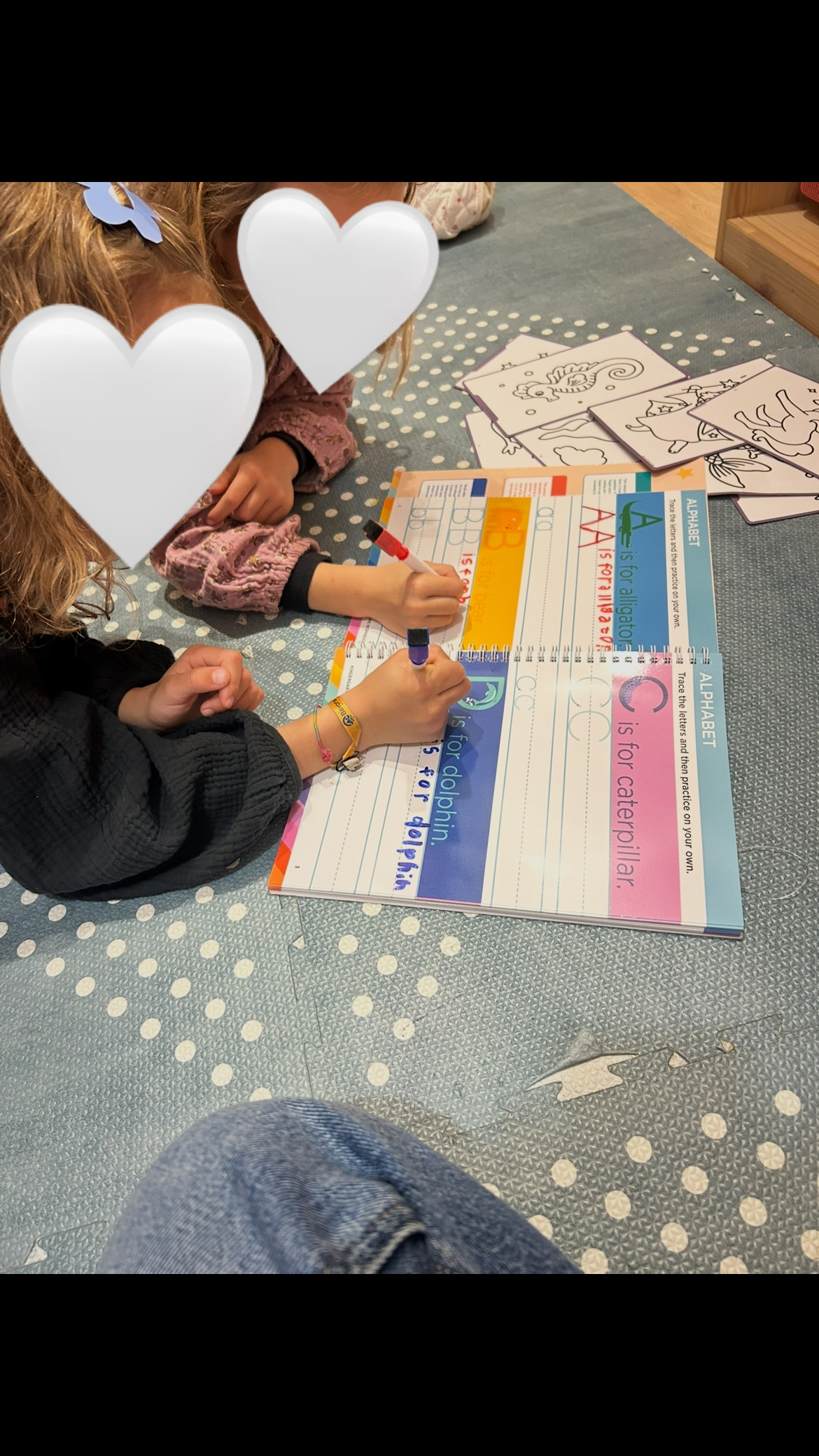 Young learners practising English writing activities during a private TEFL lesson in Spain.
