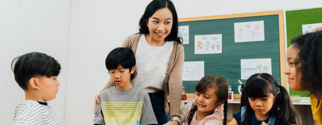 Non native English TEFL teacher leading a young learners class, showing that non native English speakers can become TEFL teachers