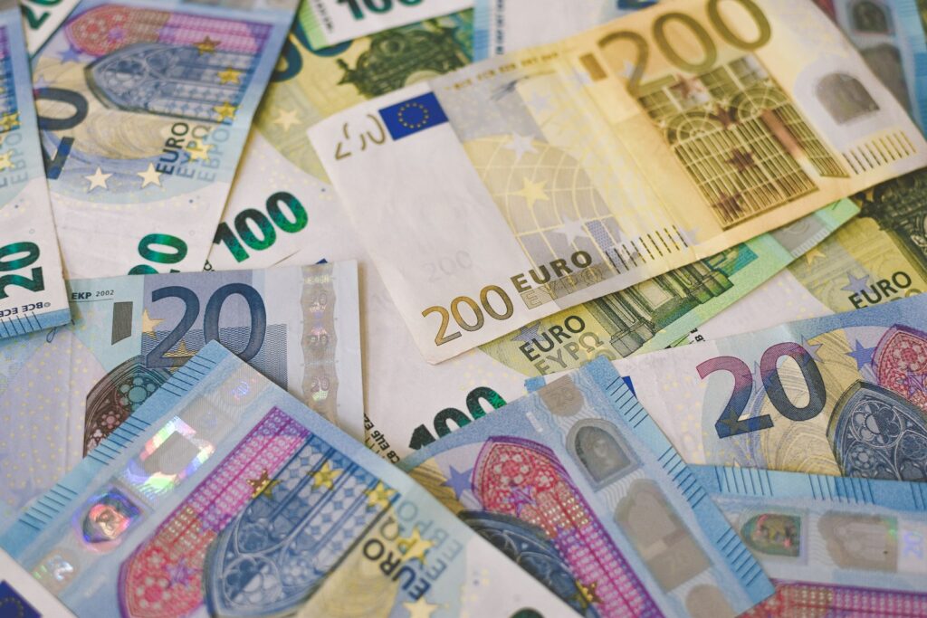 Euro banknotes in 20, 100 and 200 denominations, the currency of Greek teaching salaries