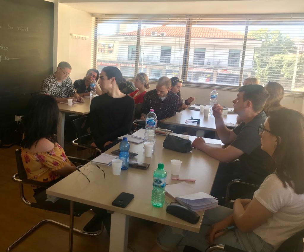 TEFL teacher in classroom with students in Italy