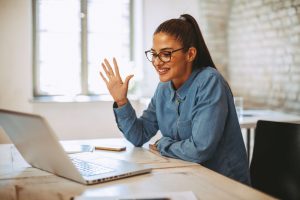 Online teacher with laptop. 120‑hour vs 180‑hour TEFL