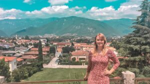 Jess Italy Intern, English teacher enjoying a quiet piazza on a day off, highlighting TEFL solo travel in one of the safest countries for TEFL teachers.