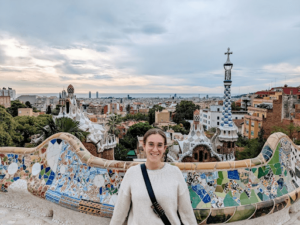 teach in spain, teach english in costa del sol, TEFL teacher exploring colourful streets in Spain between lessons, showing confident solo teaching abroad.