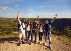 Young travellers hiking together on a weekend adventure while teaching English abroad