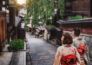 Traditional Japanese street with people in kimono, illustrating cultural immersion for beginner TEFL teachers in Japan