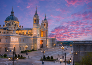 Sunset view of a Spanish cathedral and plaza, representing life outside the classroom when you teach English in Spain without a degree