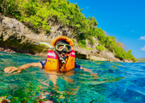 Snorkelling in crystal clear water while taking a break after moving abroad from Ireland to teach English