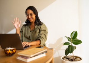 Prospective TEFL teacher studying sample interview questions on a laptop