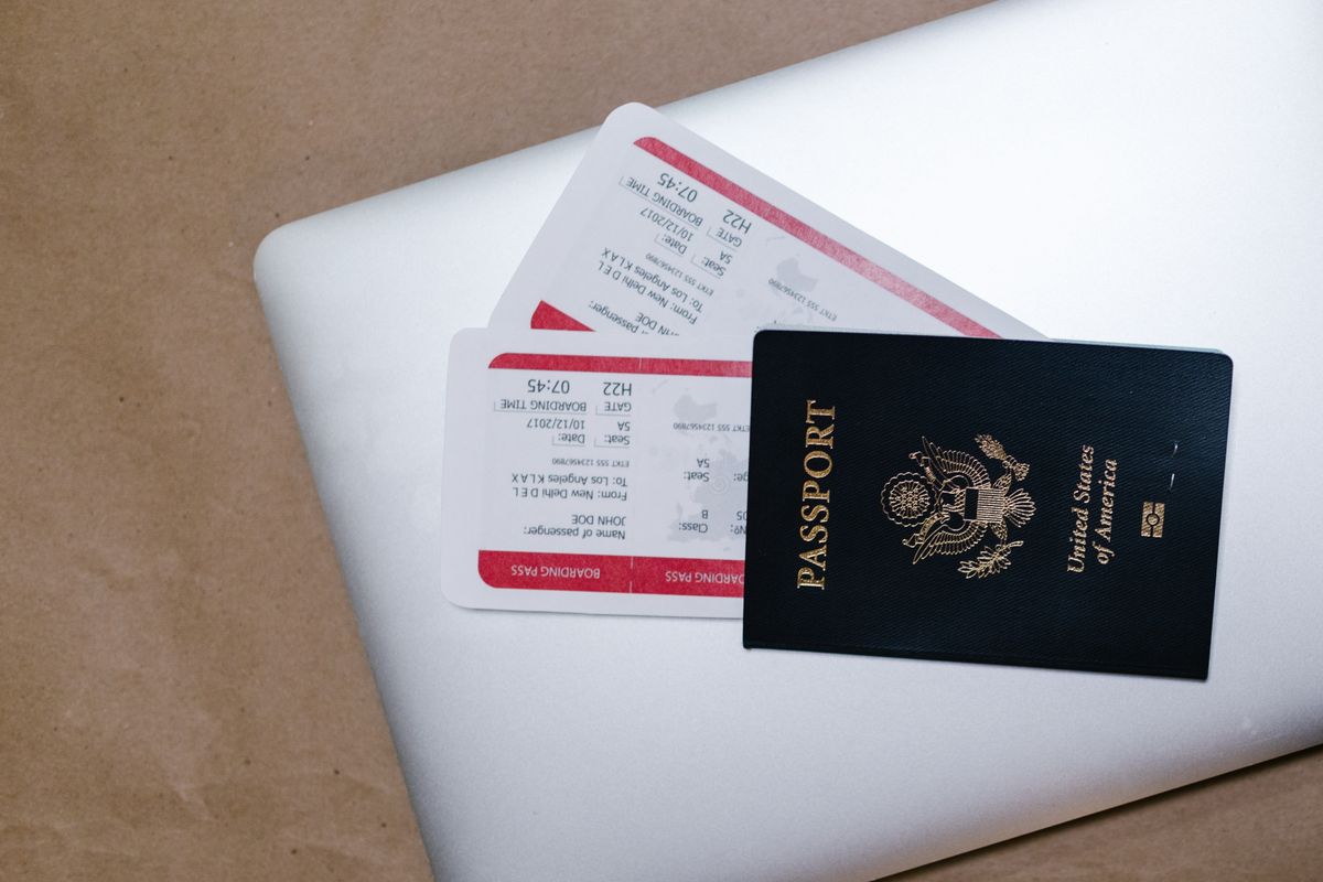 Passport and travel documents packed ahead of a paid TEFL internship abroad