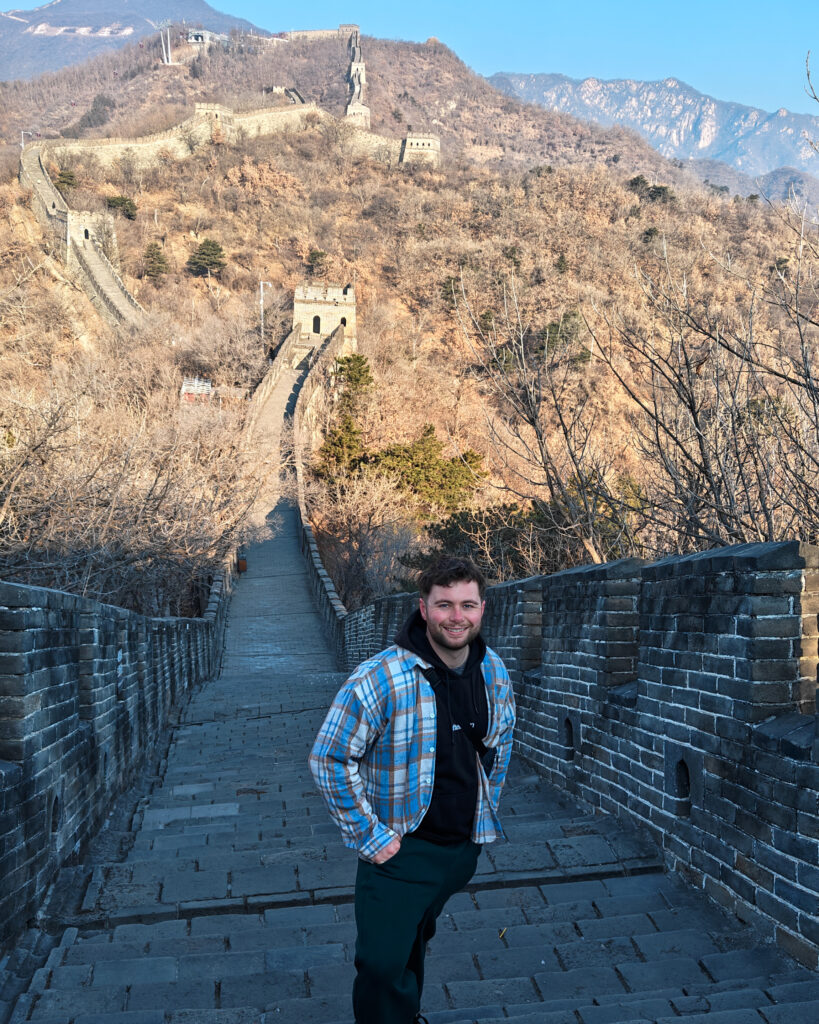 Jack Cleary exploring the Great Wall of China while living and teaching in Asia