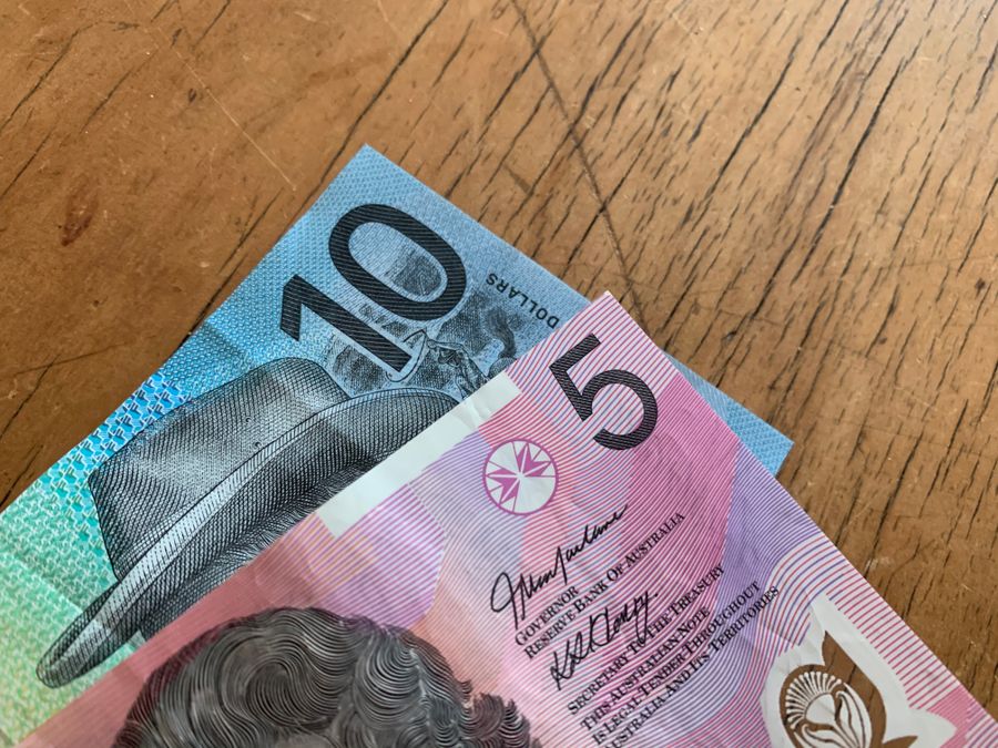 Australian dollar banknotes representing the cost of a TESOL course in Australia