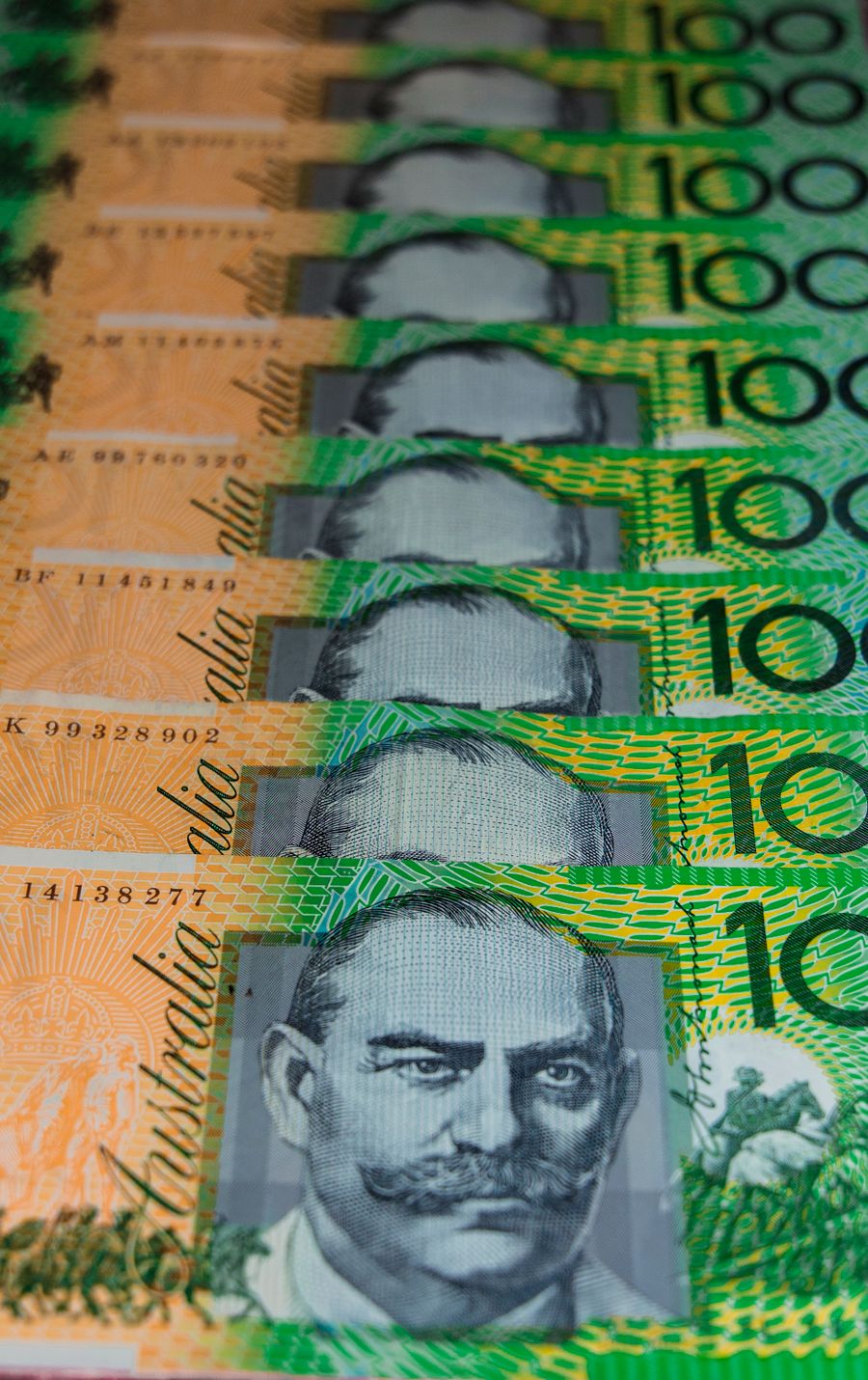 Close up of Australian dollars used to compare TESOL course costs and government funding in Australia